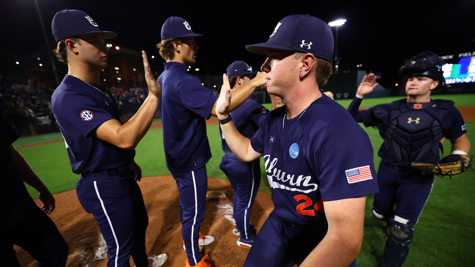 Record crowd sees No. 4 Auburn win Regional opener 9-5 over CCSU ...